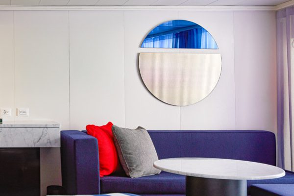 Virgin Voyages Brilliant Suite living room, a RockStar Quarters tier suite