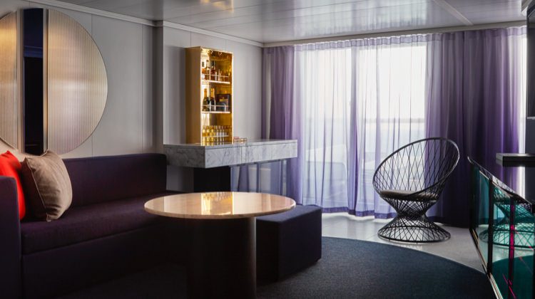 Virgin Voyages Fab Suite living room, a Mega RockStar Quarters suite